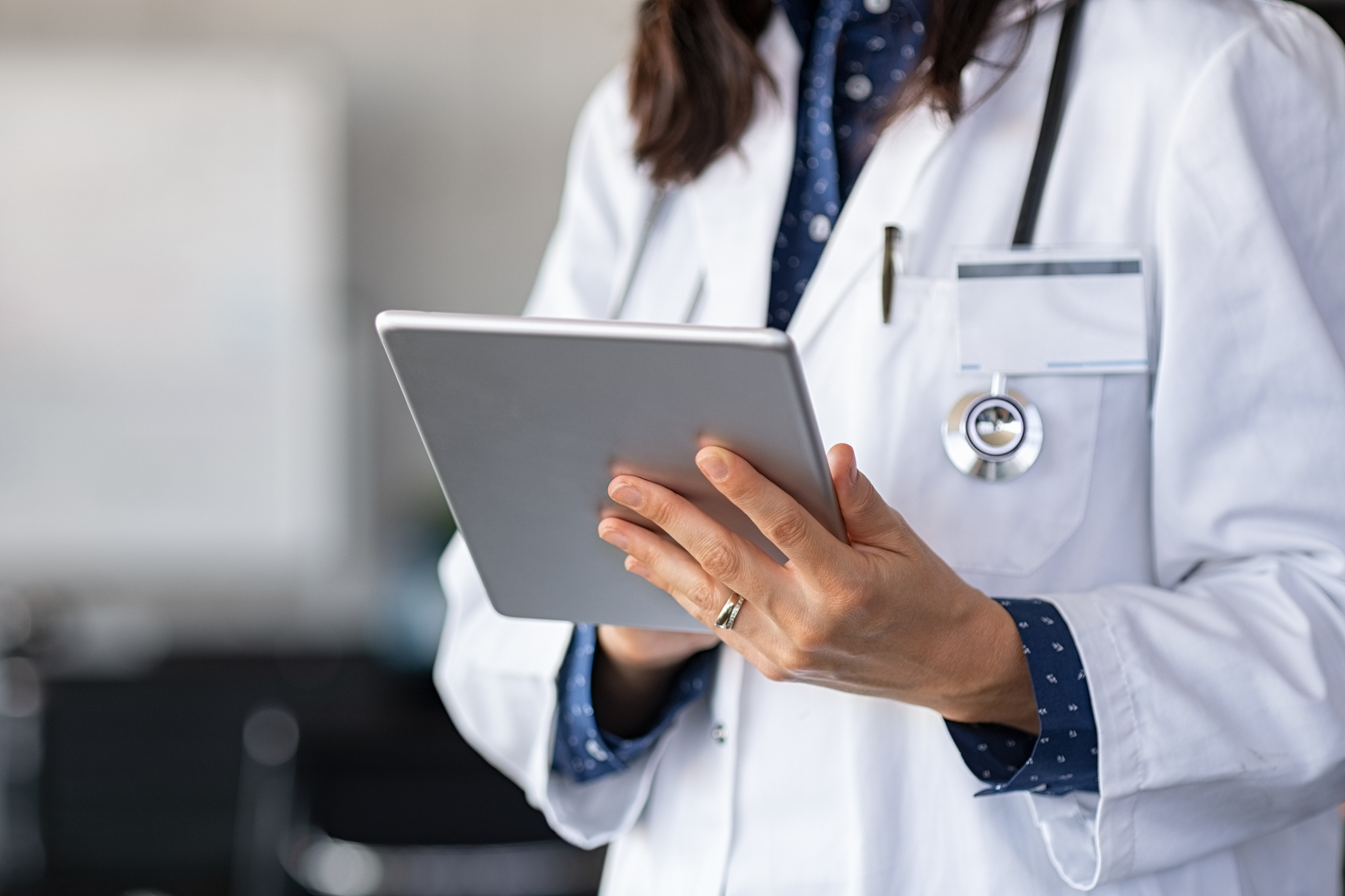 Healthcare worker on tablet
